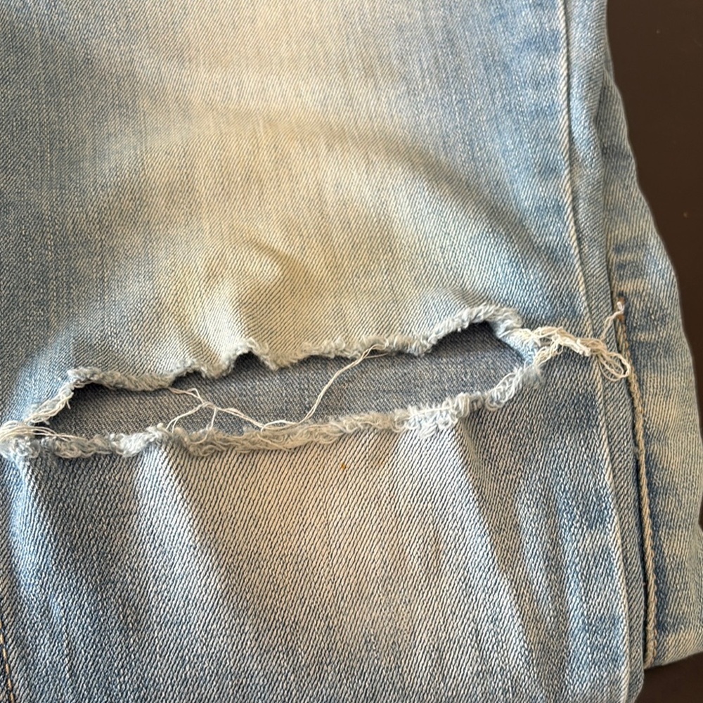 Distressed Light Blue Jeans